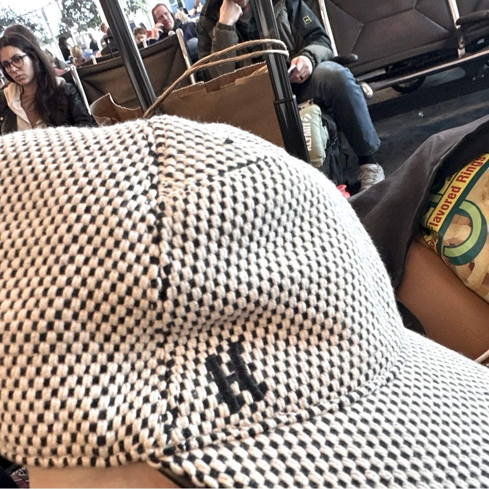 Genuine Hermes tweed baseball cap in black and white.  NWT never worn.